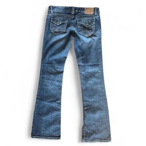 Amethyst Blue bootcut denim Y2K low rise distressed jeans